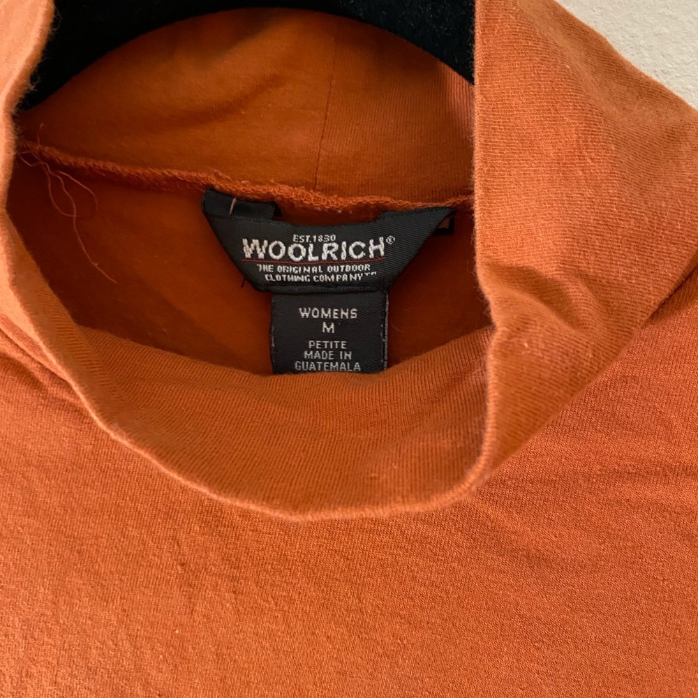 terracotta turtle neck